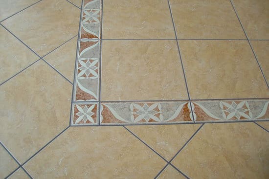Ceramic tile floor with accent tiles