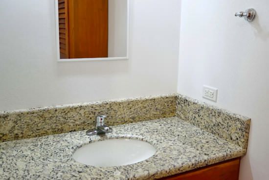 Corian bathroom countertop with white recessed sink