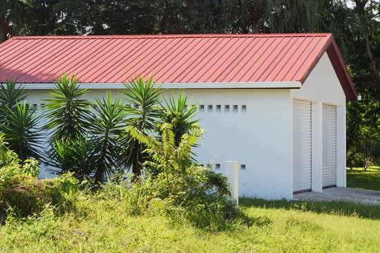 Detached garage with red roof