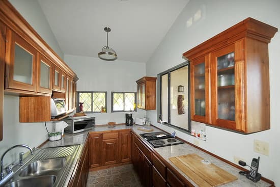 Kitchen with glass front cabinets